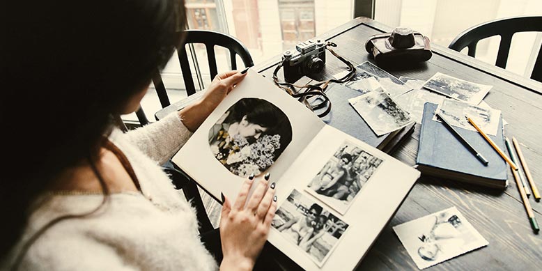 girl holding album